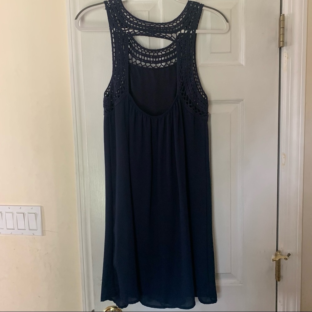 This medium, navy blue dress is from Francesca’s